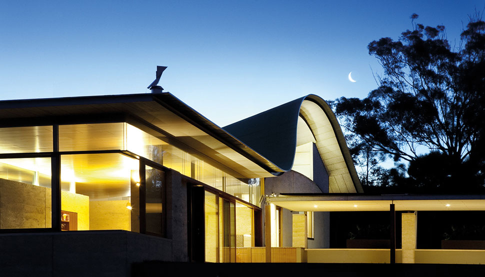 The gentle sine curve of the roof required straight materials in short lengths.