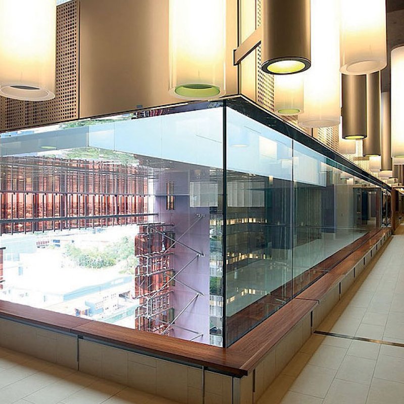 The atrium is enclosed by walls of glazing and a glass ceiling